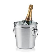 A bottle of champagne in a bucket of ice.