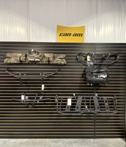 Can-Am® ATV accessories hanging on a wall.